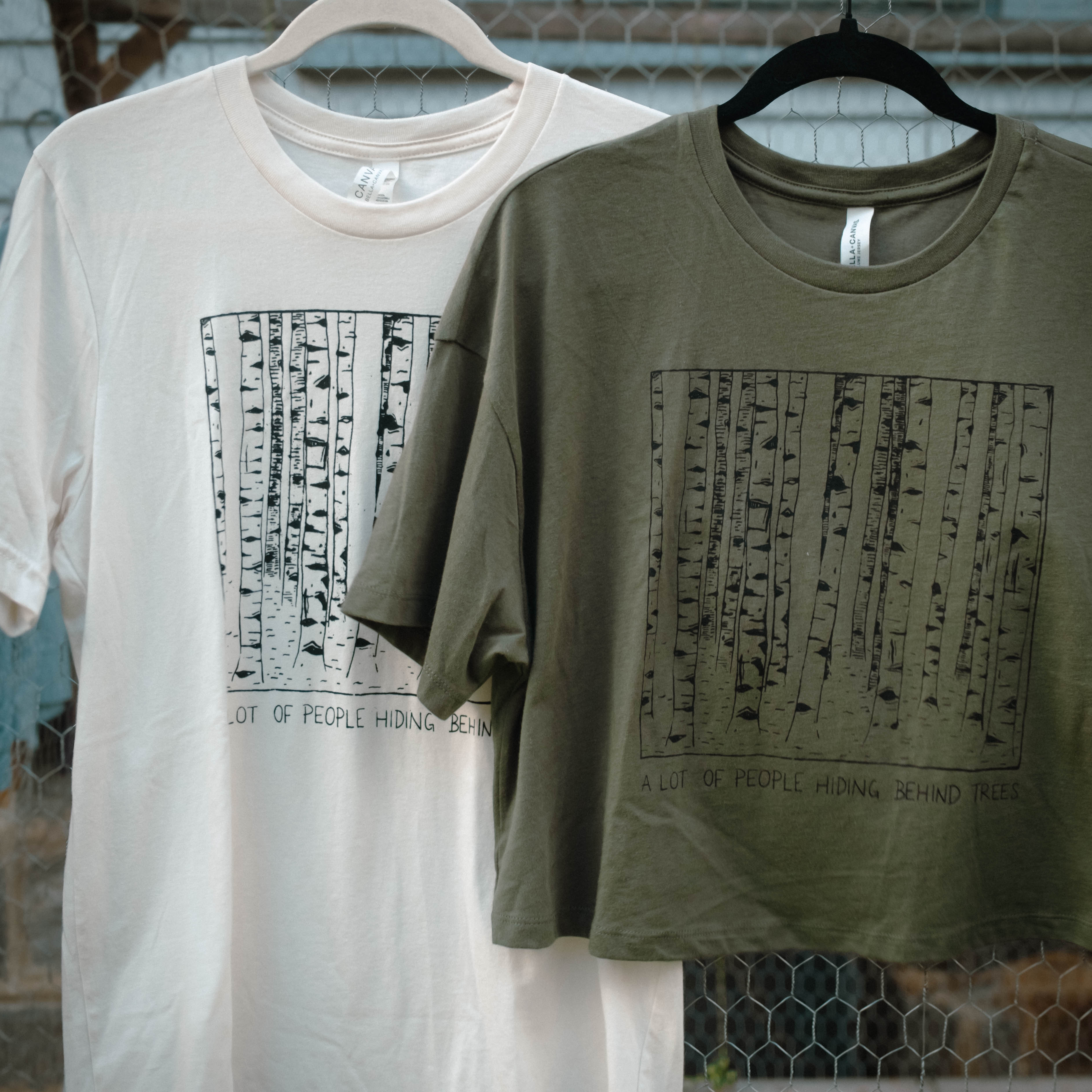 A LOT OF PEOPLE HIDING BEHIND TREES TEE & CROP